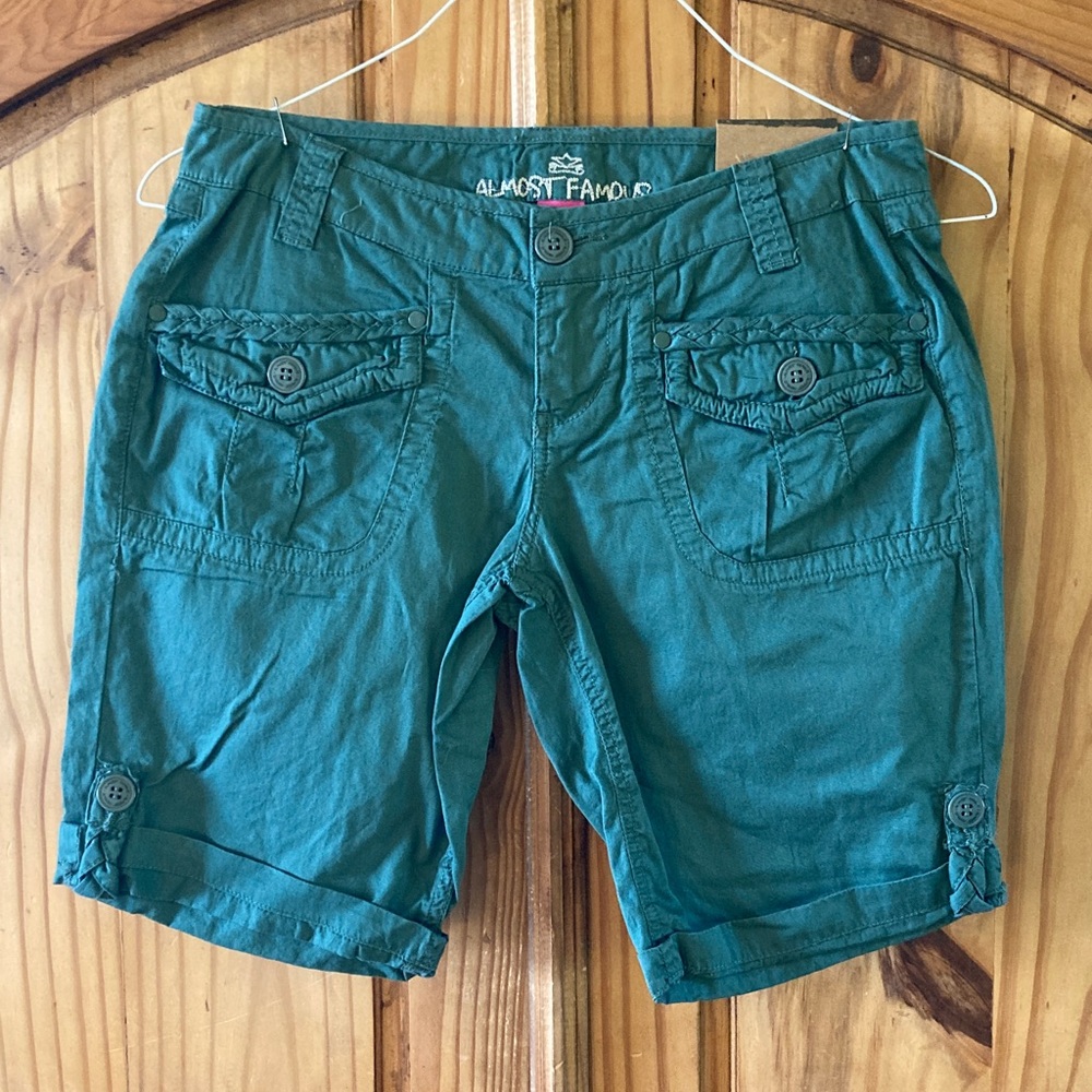 Almost Famous green cuffed hem long shorts size 7 - NWT